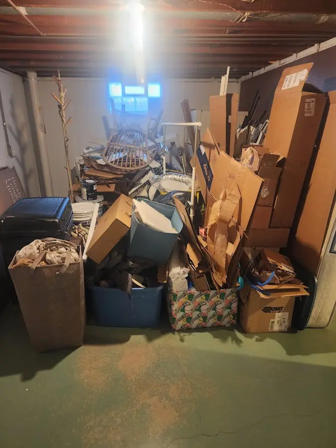 Roll-off dumpster container at job site for 4 Yard Dumpster Rental in Sparta